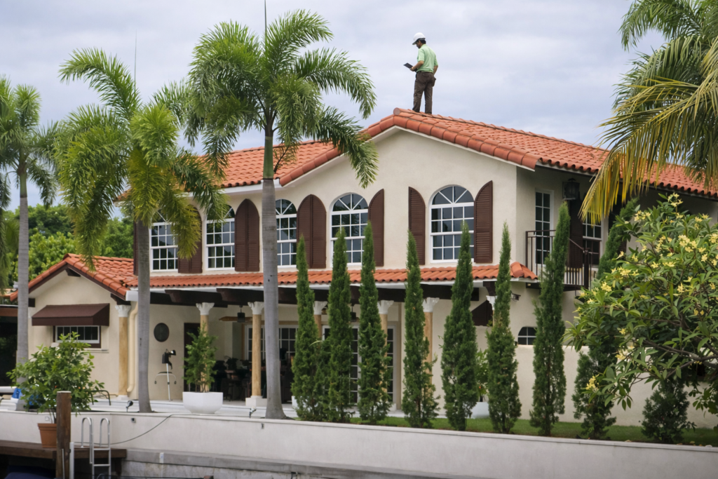 A roof inspection during a full home inspection in Hialeah.