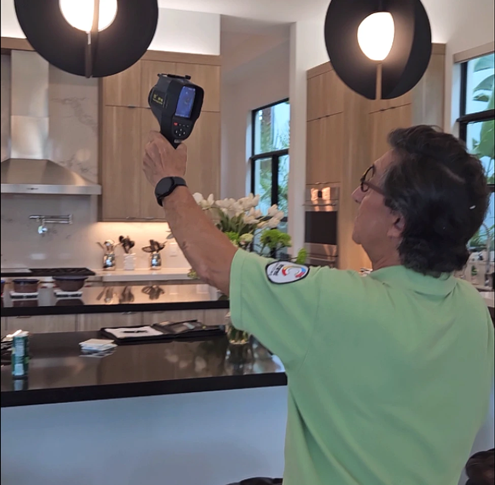 Thermal imaging inspection to detect moisture and potential leaks inside a home.